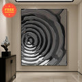Abstract black and white topographic map with concentric contour lines forming a spiral pattern
