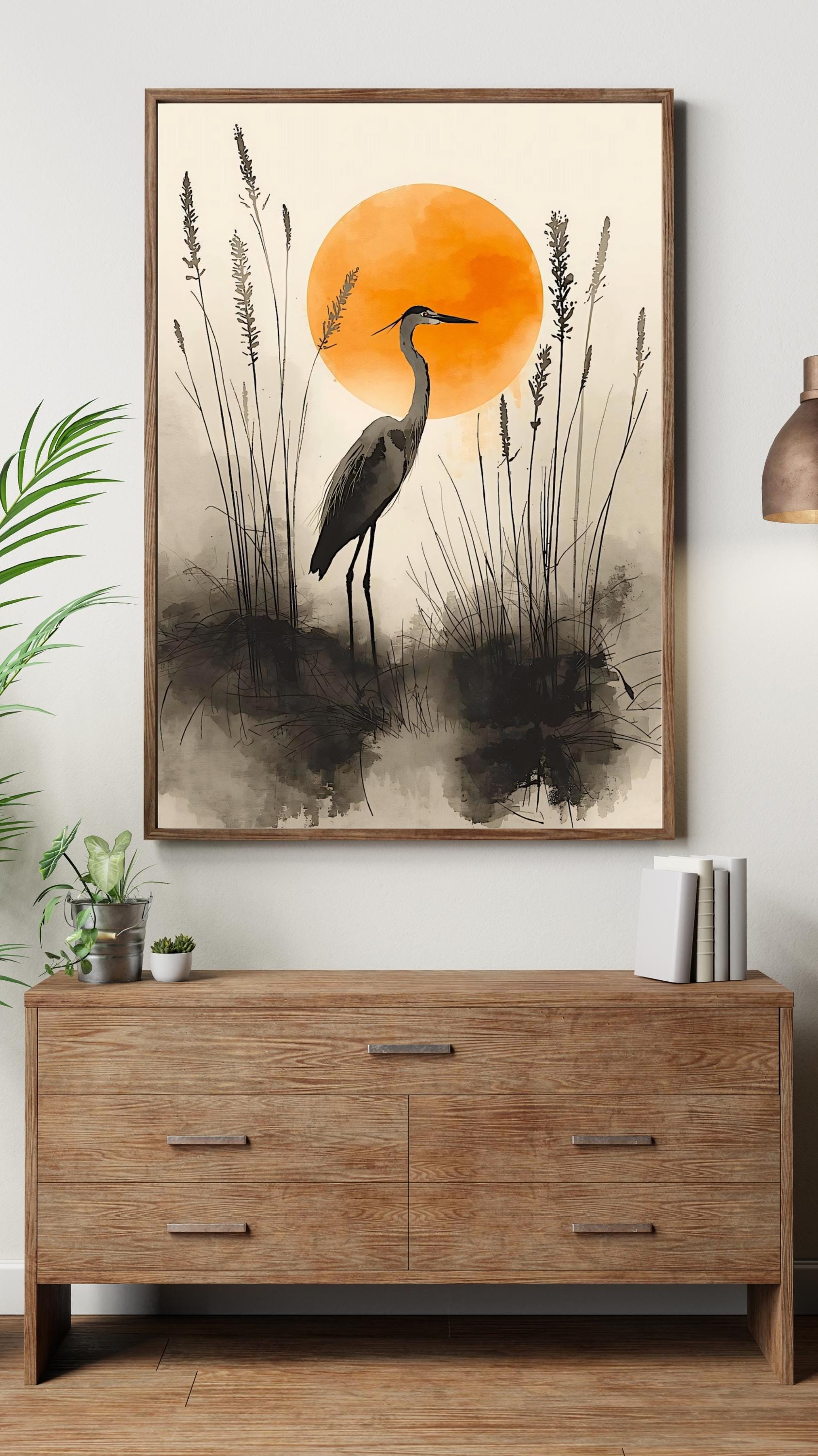Contemporary nature art showing a heron in marsh grass, muted earth tones and a bold orange sun.