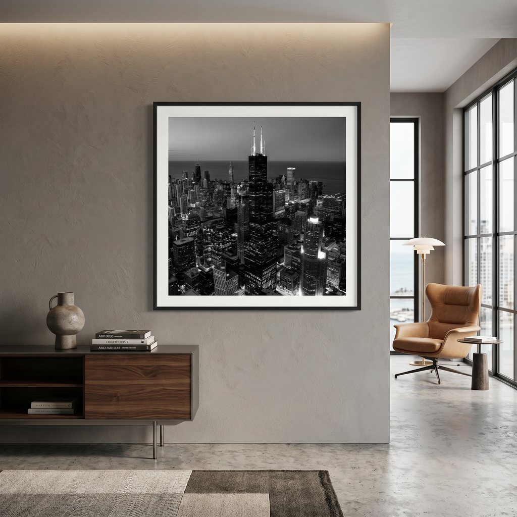 Monochrome aerial photography of Chicago city center at dusk with Lake Michigan in the background
