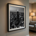 Aerial black and white photo of Chicago skyline at night with Willis Tower in the center