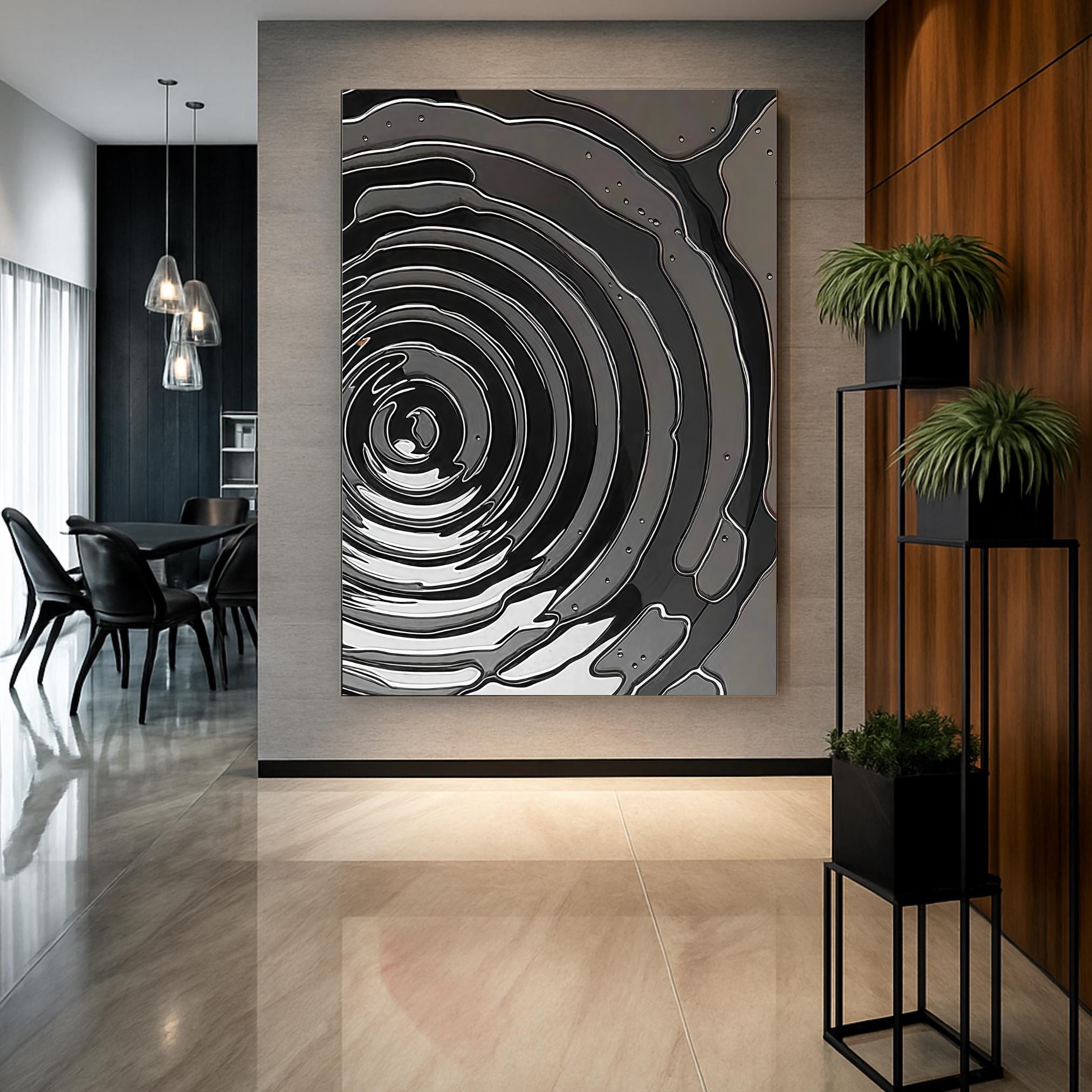 Black ink ripple effect creating hypnotic spiral pattern with white outlines
