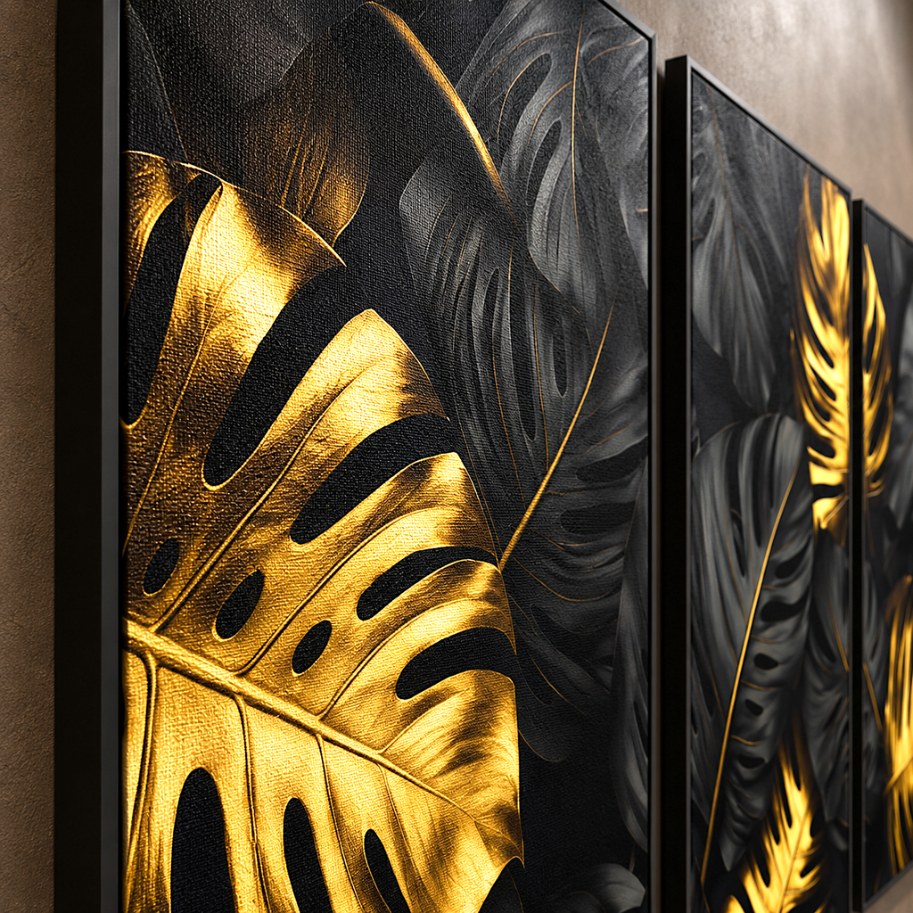 Gold monstera leaf glowing against black canvas above a moody entryway console