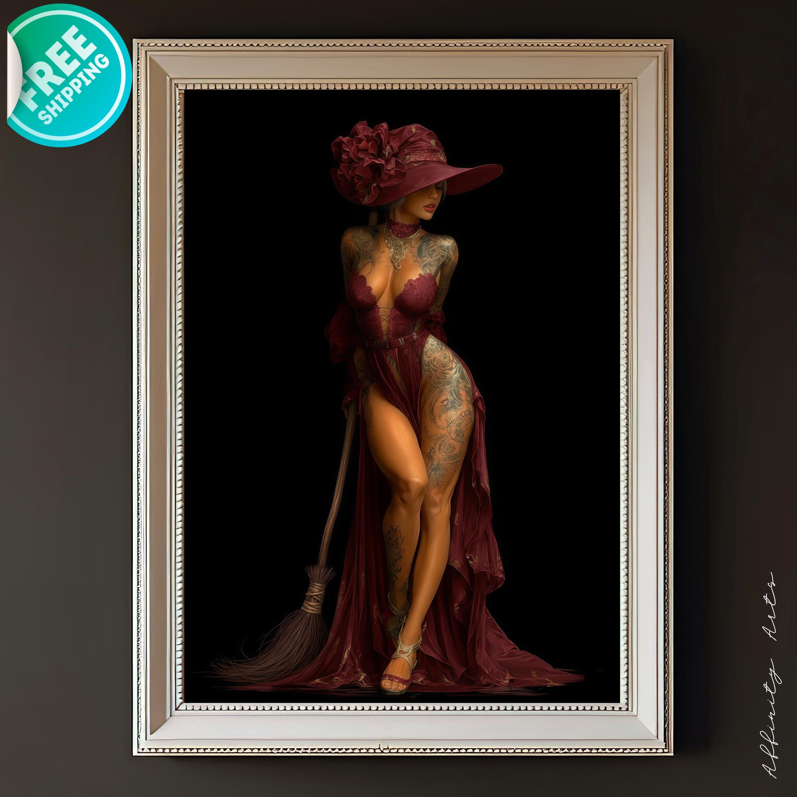 A seductive tattooed woman in a flowing burgundy witch dress, wide-brimmed red hat adorned with a large rose, holding a broom, posing confidently on a black background.