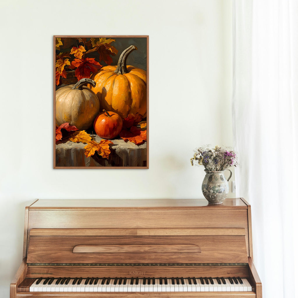 Autumn harvest still life featuring pumpkins, a red apple, and scattered maple leaves.