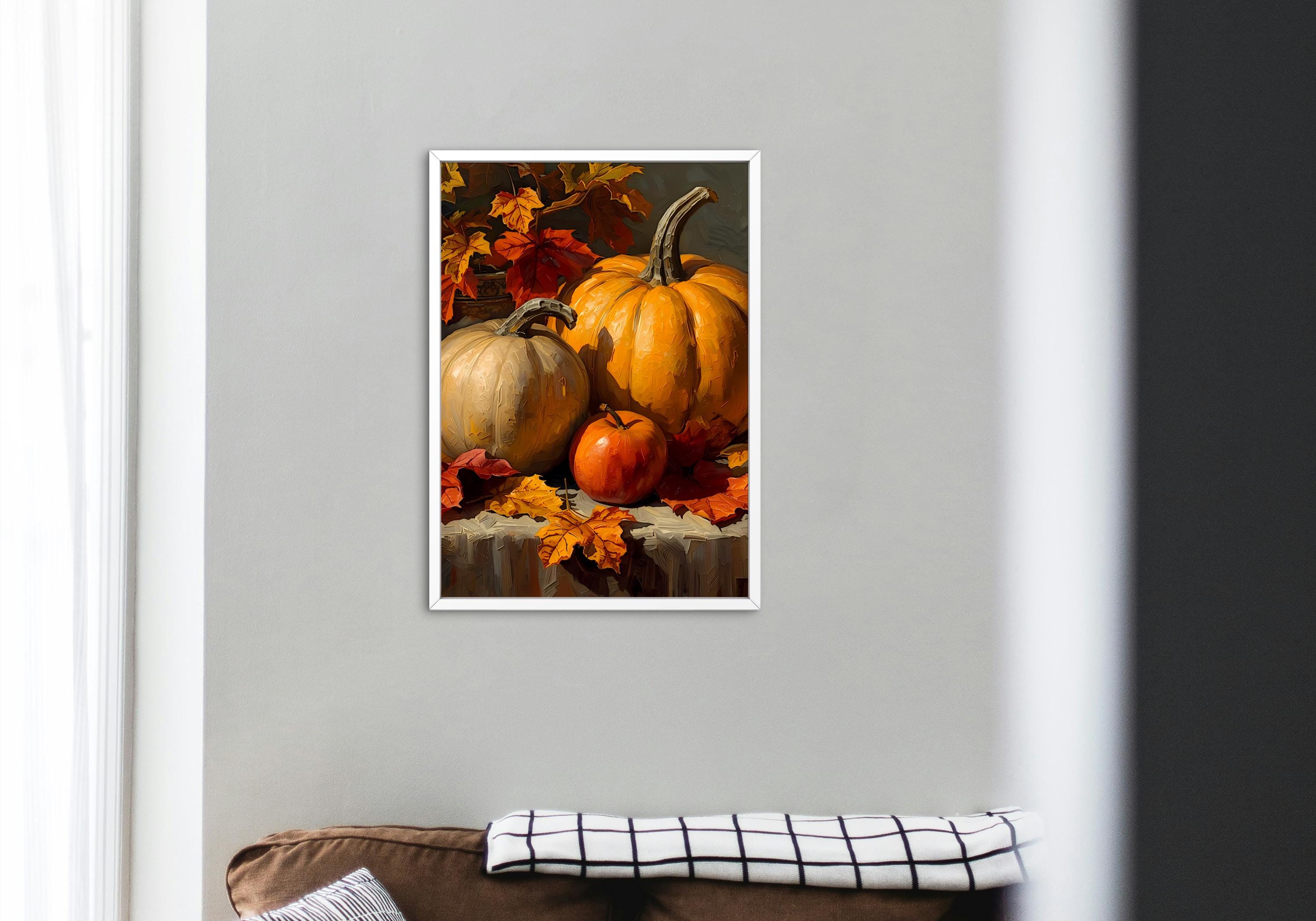Harvest season composition with pumpkins, a red apple, and vibrant fall foliage.