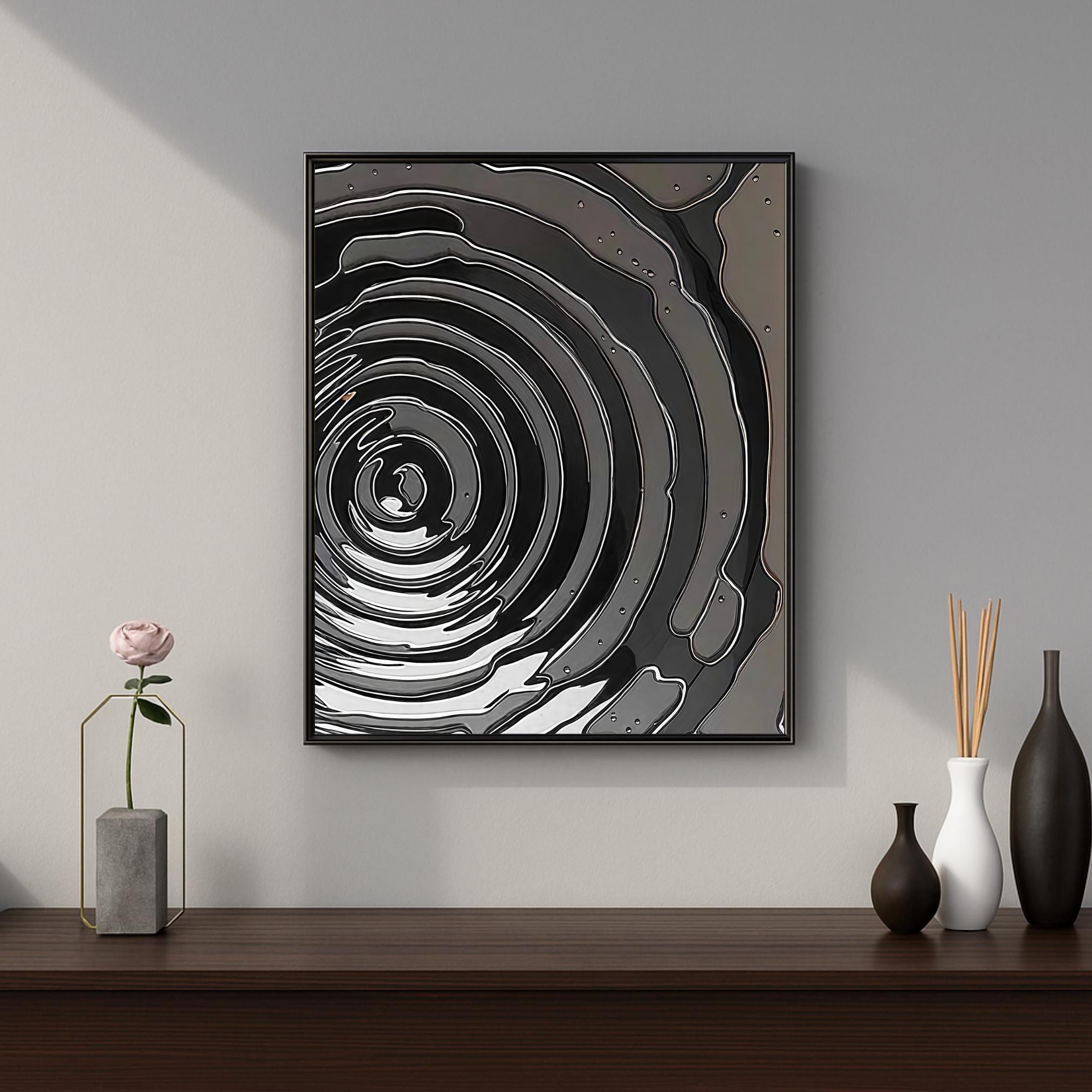 Dark fluid art composition with glossy concentric waves and metallic highlights
