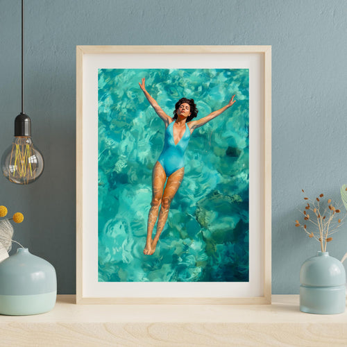 Relaxed female swimmer drifting in crystal-clear blue lagoon, eyes closed, arms extended, wearing sleek navy swimsuit.